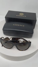 Load and play video in Gallery viewer, Sunglasses by Versace
