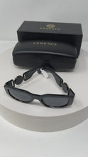 Load and play video in Gallery viewer, Sunglasses by Versace
